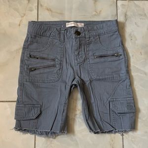 Grey cargo shorts.